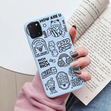 a woman holding a book and a phone case