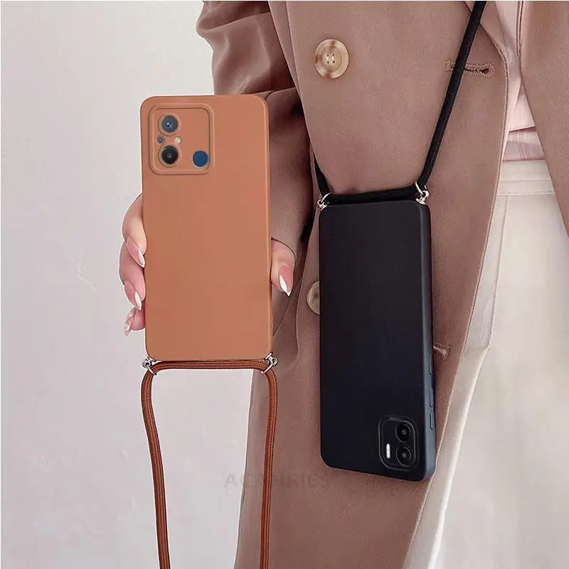 a woman holding a brown phone case