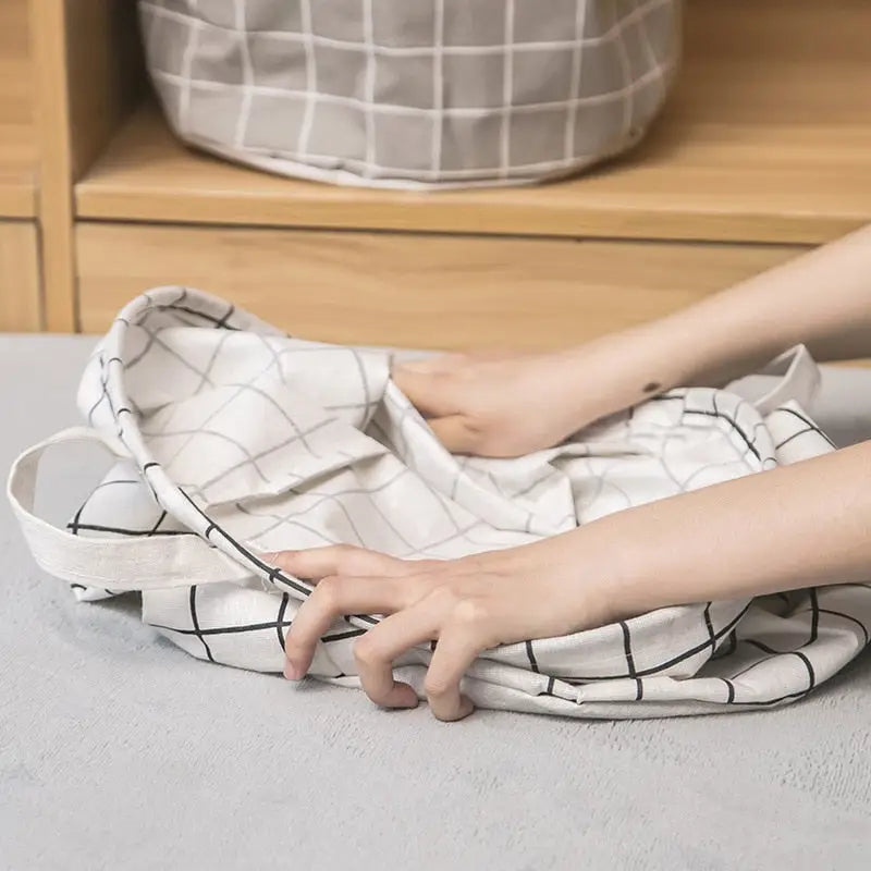 a woman is cleaning the floor with a cloth