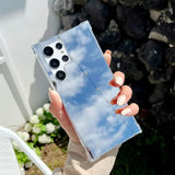 a woman holding up a clear case for the iphone 11