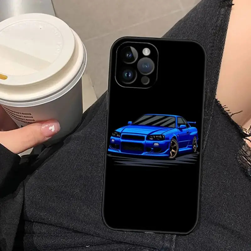 a woman holding a cup and a blue car