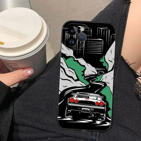 A woman holding a cup and a phone case