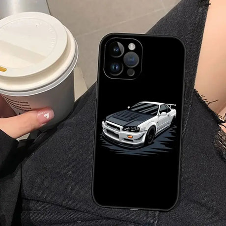 A woman holding a cup and a phone case