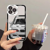 A woman holding a drink and a phone case