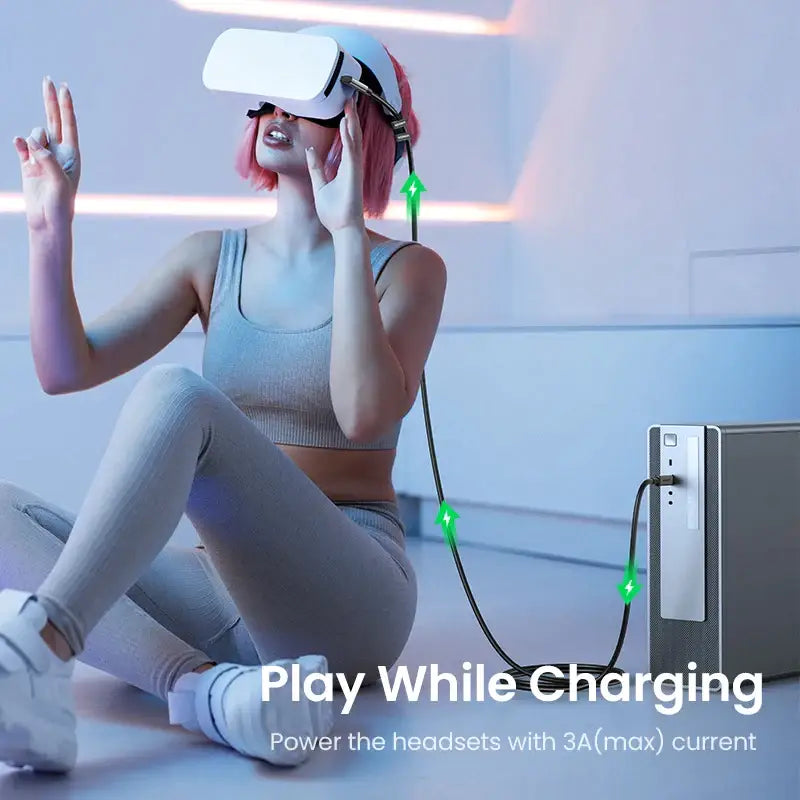 a woman sitting on the floor with a vr headset