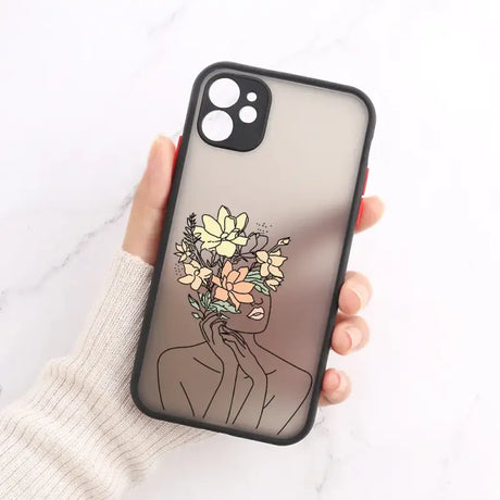 A woman holding a flower phone case