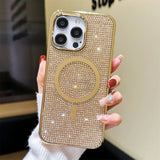 a woman holding a gold iphone case with a ring on it