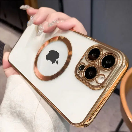 A woman holding a gold iphone case