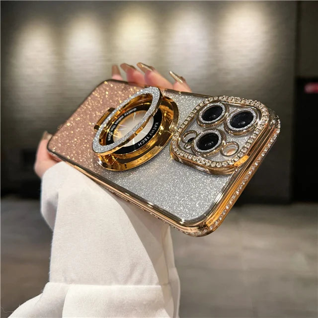 a woman holding a gold and silver ring case