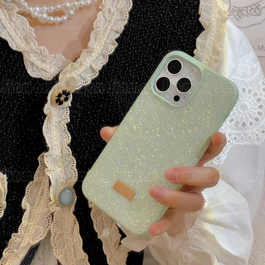 a woman holding a green phone case