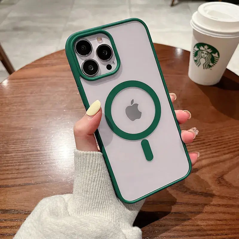 a woman holding a green phone case