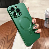 a woman holding a green phone case with a phone holder