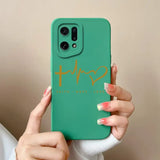 a woman holding a green phone case with the word hh on it