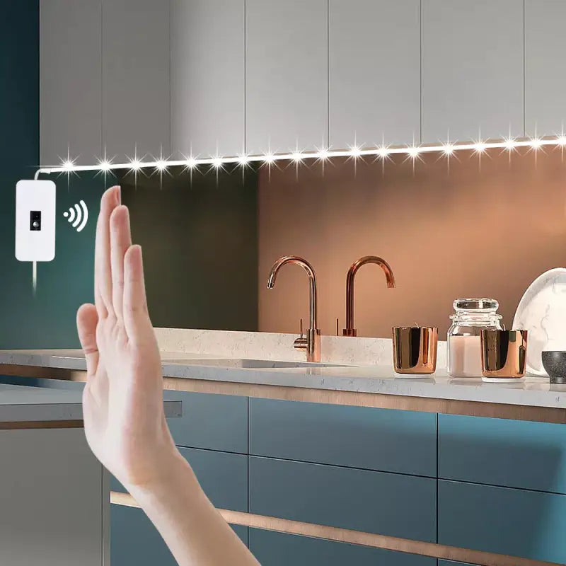 a woman is holding her hand up to a smart light