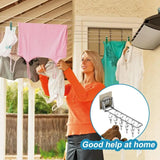 a woman hanging clothes on a clothes line