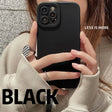 a woman holding a black iphone case