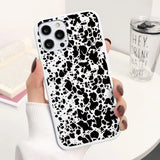 a black and white spotted cow pattern iphone case