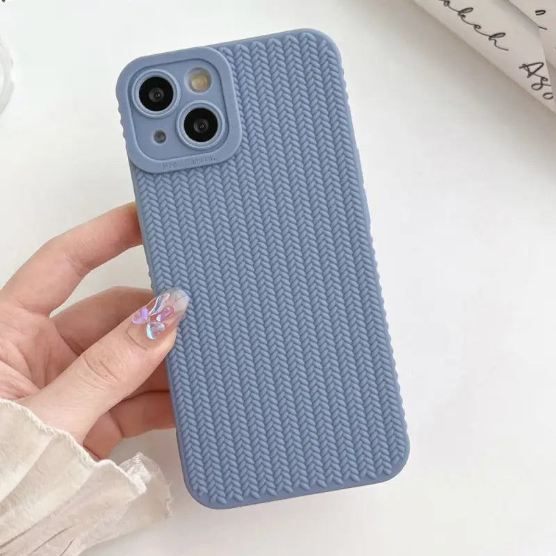the case is made from a soft blue knit fabric