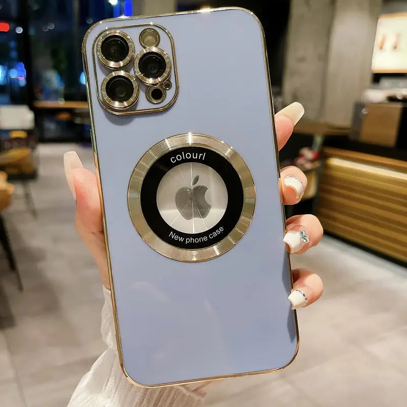 a woman holding a blue iphone case with a camera