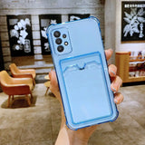 a person holding a blue phone case