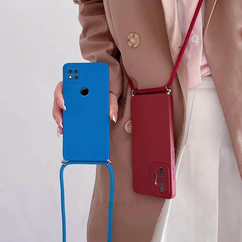 a woman holding a red and blue phone case