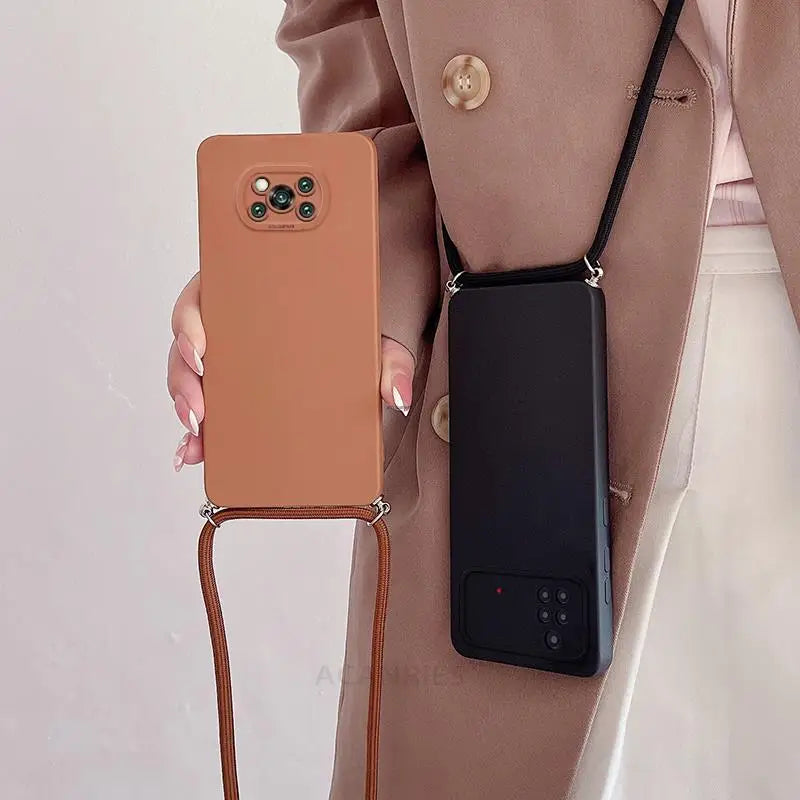 a woman holding a brown phone case