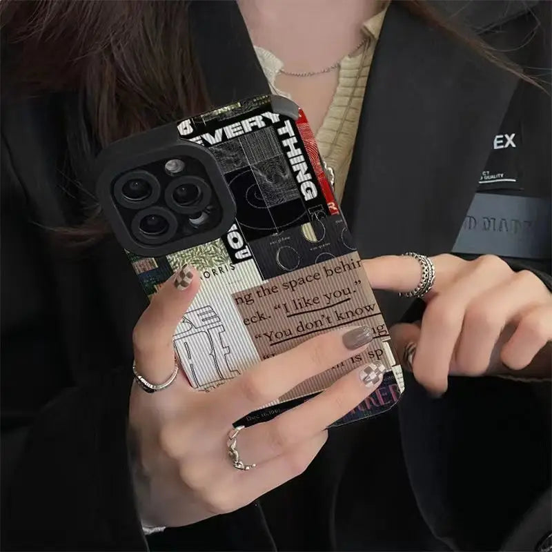 a woman holding a camera and a card