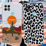 a person holding up a phone case with a desert scene