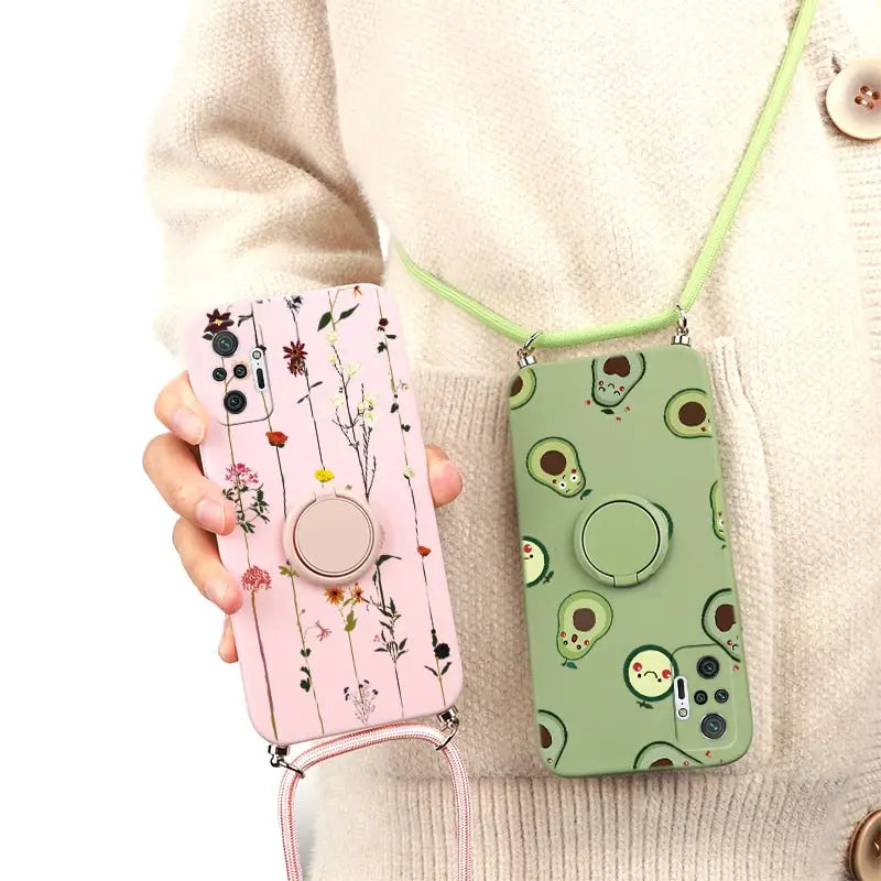 a woman holding a cell case with a flower pattern