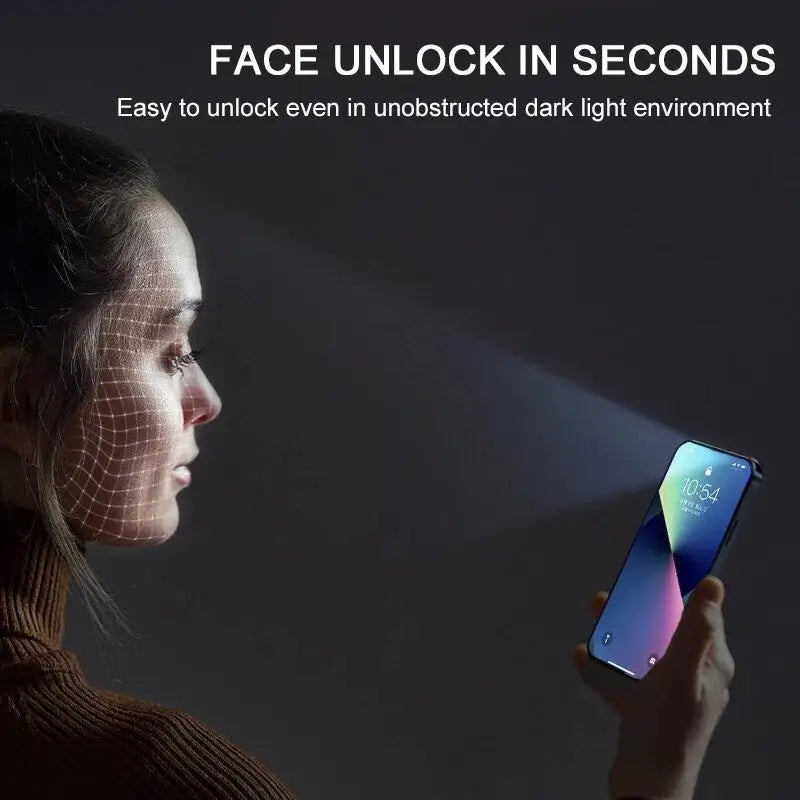 a woman holding a cell phone with a light coming from the screen