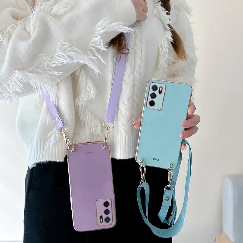 a woman holding a cell phone case