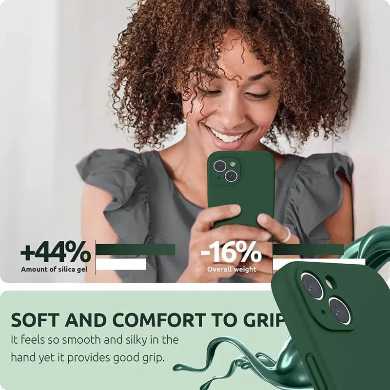 a woman holding a cell phone with a green screen