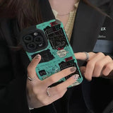 a woman holding a cell phone case with a camera