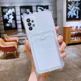 a hand holding a clear case with a phone in it