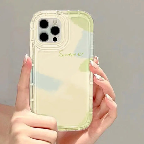 a woman holding a clear phone case