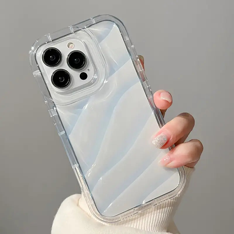 a woman holding a clear case for the iphone 11