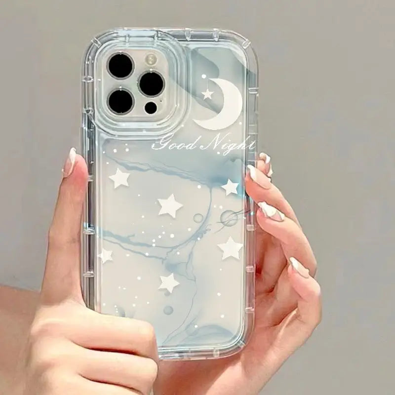 a woman holding a clear phone case with a white marble pattern
