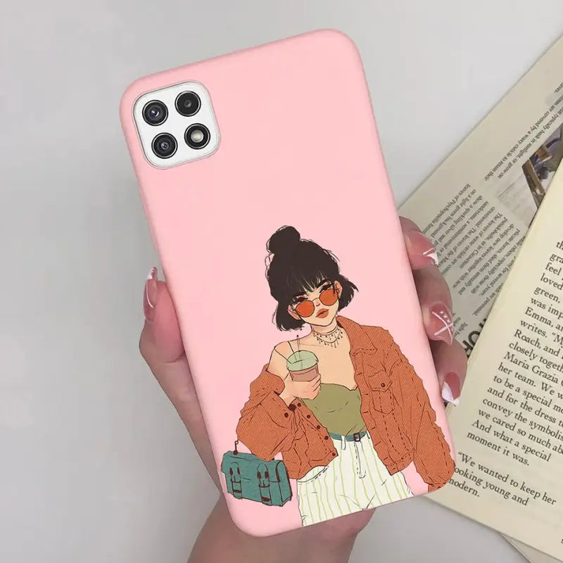 a woman holding a pink phone case with a picture of her