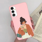 a woman holding a phone case with a picture of her