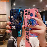 a woman holding up two different colored cases