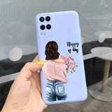 a woman holding a phone case with the words happy day
