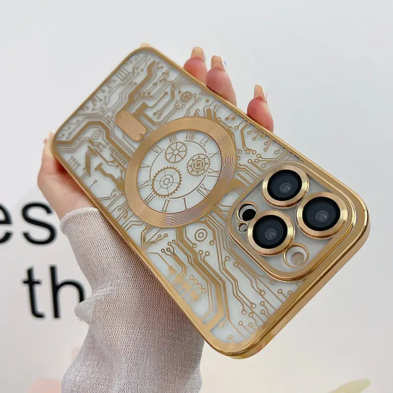a woman holding a gold iphone case with a camera