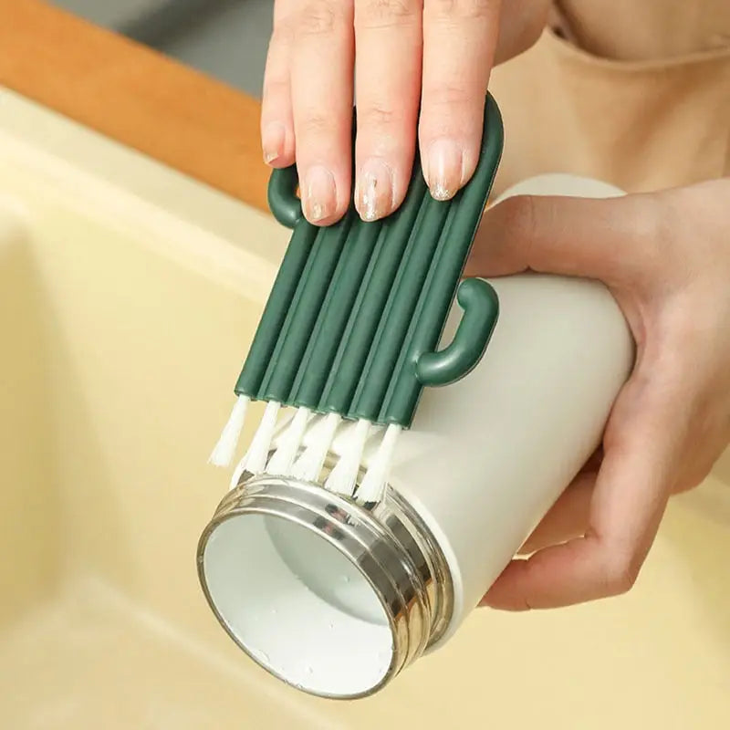 a woman is holding a green brush and a white brush
