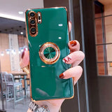 a close up of a person holding a green phone case
