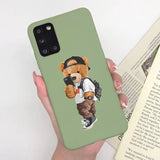 a person holding a phone case with a teddy bear