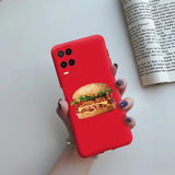 a woman holding a hamburger phone case