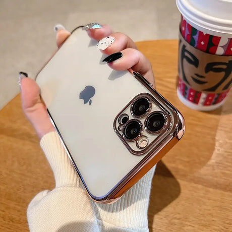 a woman holding an iphone case with a camera