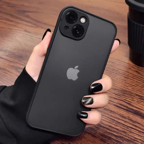 a woman holding an iphone case