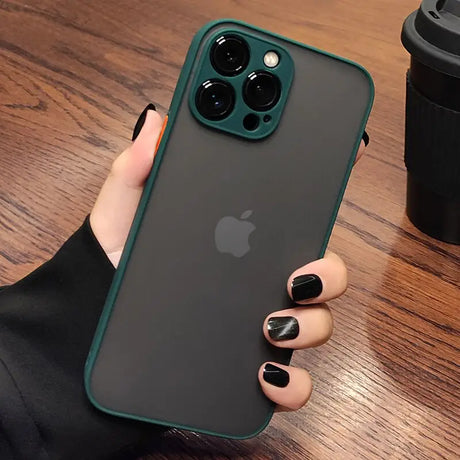 a woman holding an iphone case with a camera