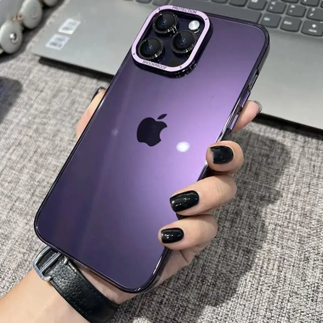 a woman holding an iphone case with a purple background